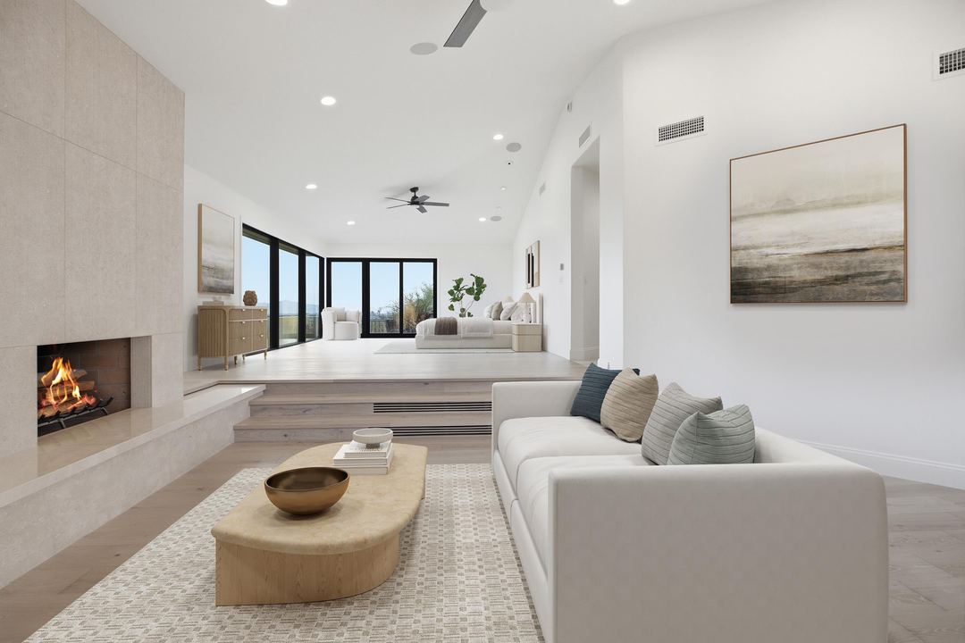 Sunken sitting room with a linear fireplace and a long view through the glass, virtually staged