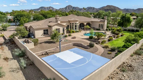 Real Estate Drone Aerial Services in Paradise Valley, AZ 6 Backyard basketball court and pool aerial view, Paradise Valley AZ home