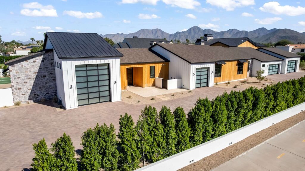 Showcase Properties with Expert Real Estate Videography in Scottsdale, AZ 4 Real estate drone photography in Scottsdale AZ showcasing modern estate driveway and McDowell Mountain backdrop