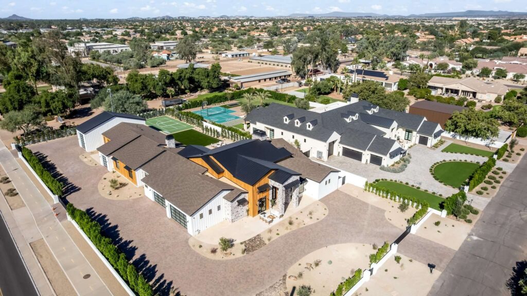 Real Estate Videography Services in Phoenix, AZ 2 Aerial real estate videography framing an expansive luxury residential property and neighborhood in Phoenix, AZ