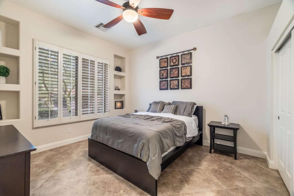Real Estate 3D Tour Services in Paradise Valley, AZ 2 Guest bedroom with plantation shutters, real estate video Paradise Valley AZ
